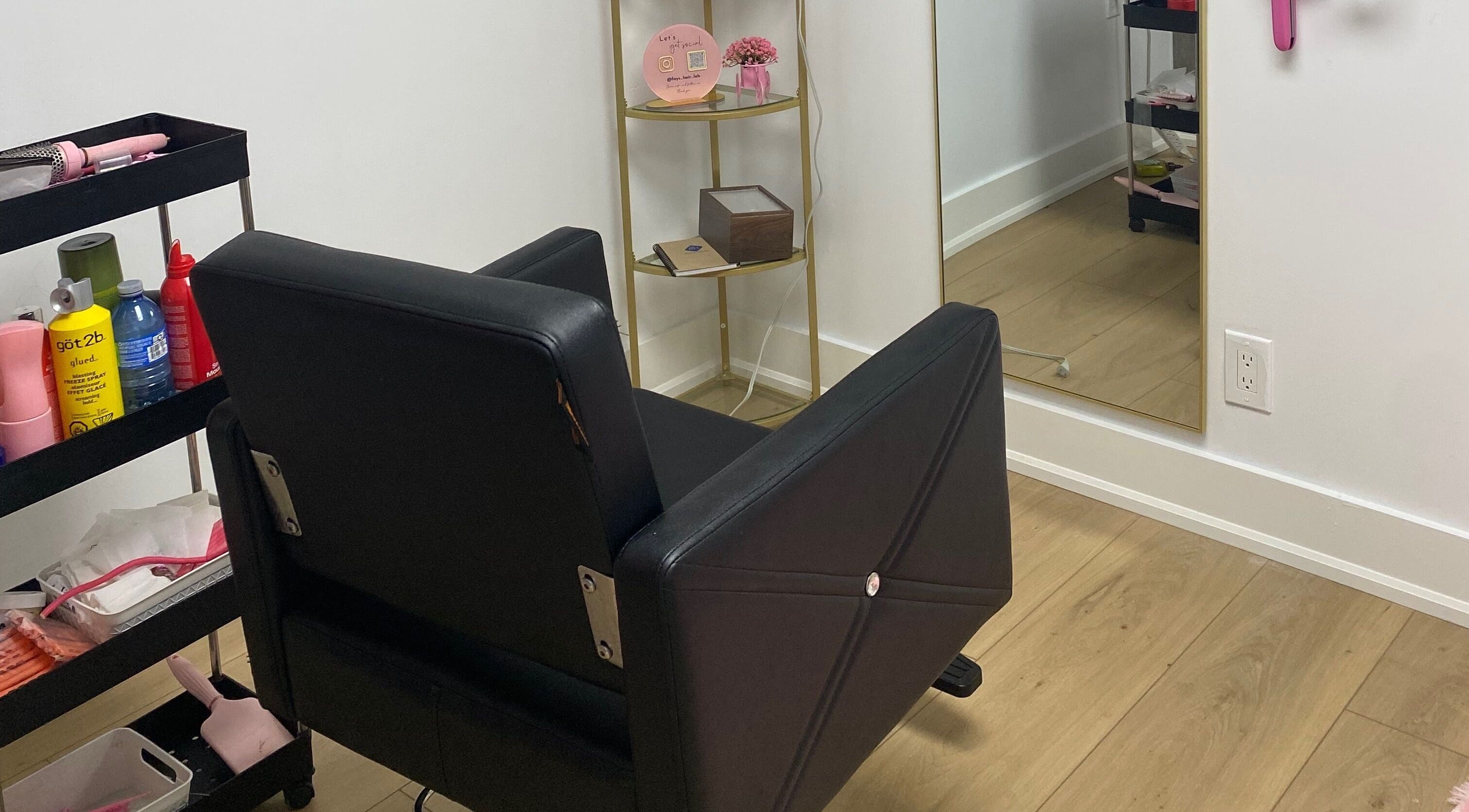 Elegant salon chair and mirror at Paradise Glamour Lounge INC., St. Catharines, Ontario, CA.