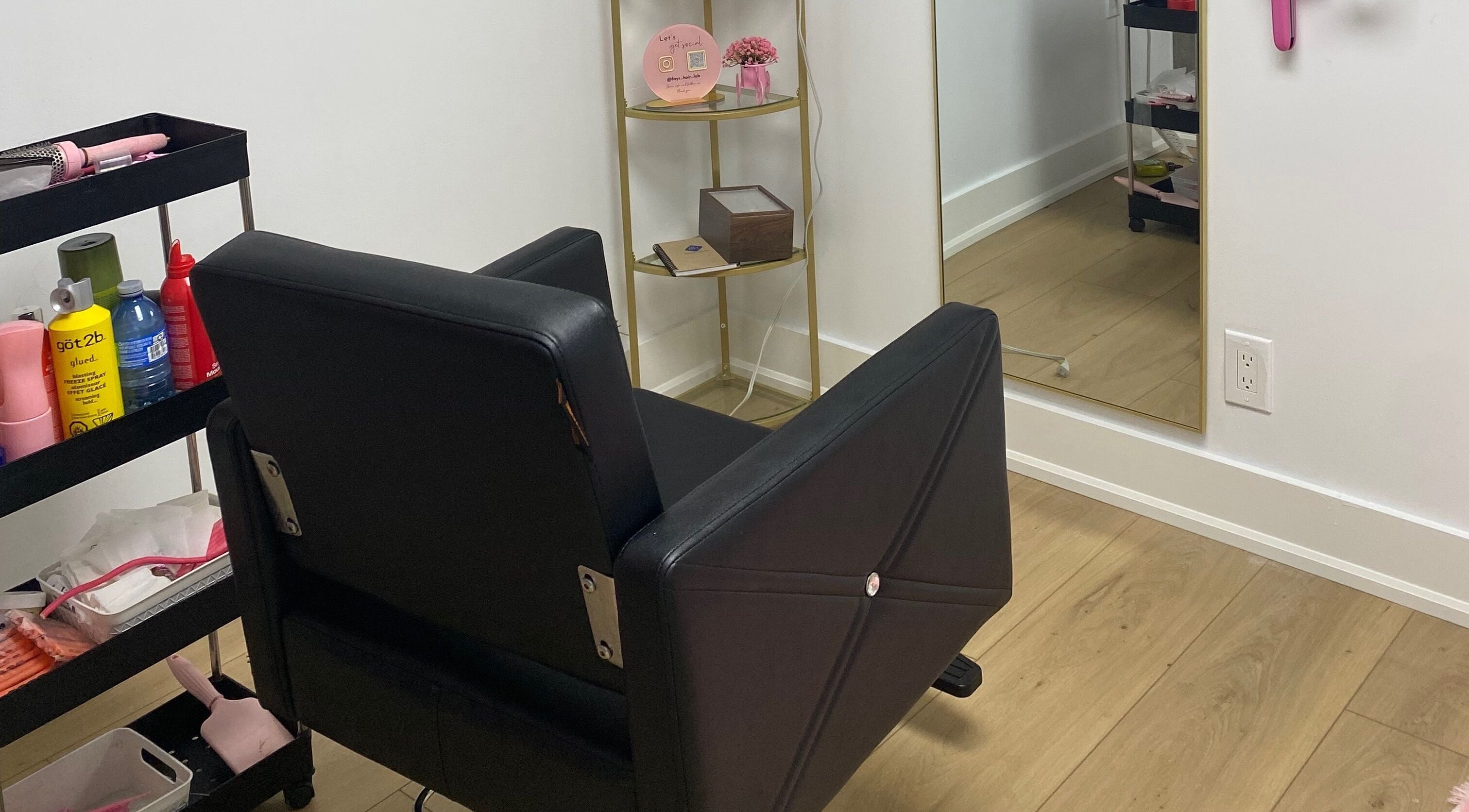 Elegant salon chair and mirror at Paradise Glamour Lounge INC., St. Catharines, Ontario, CA.