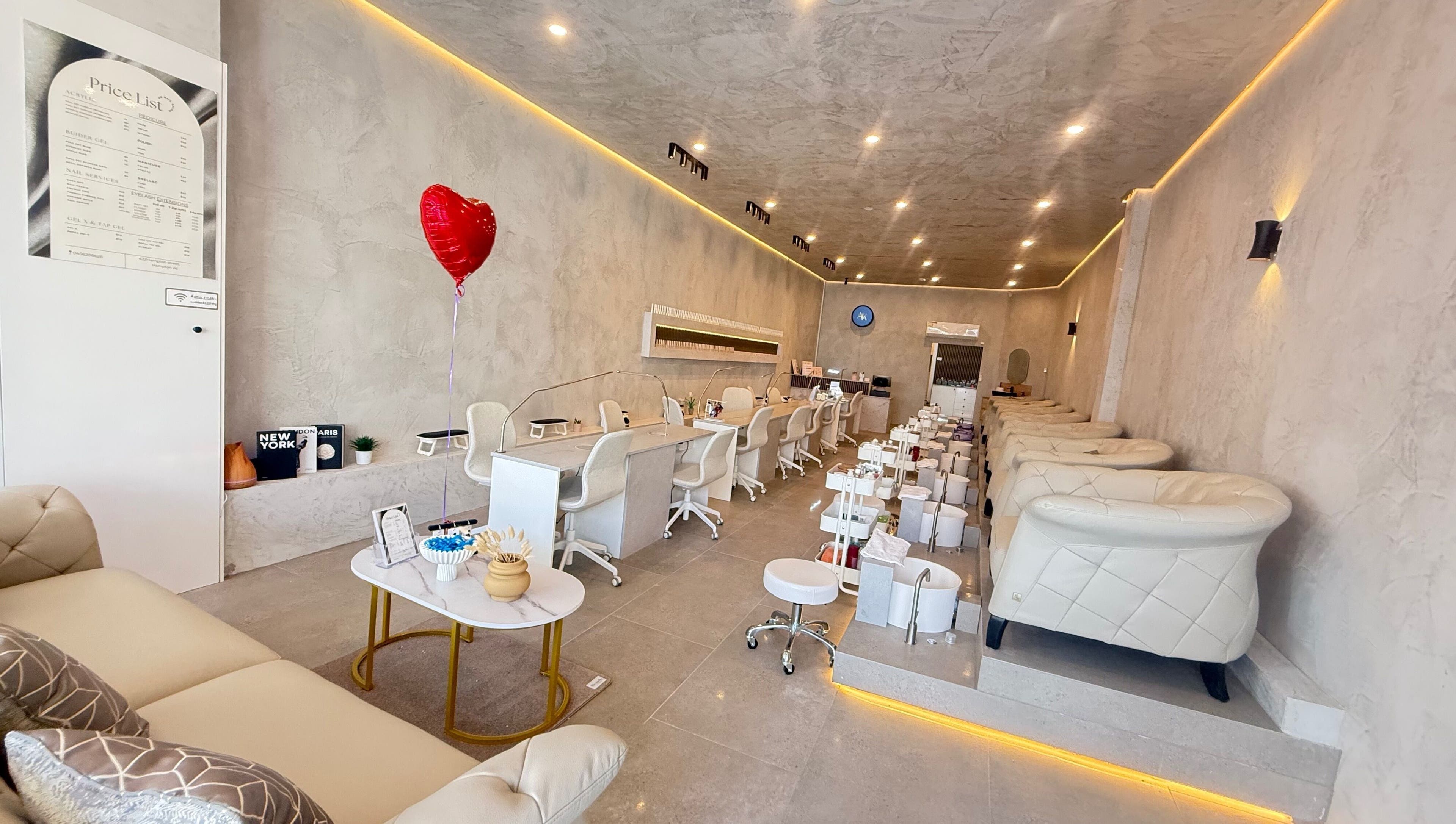 Elegant interior of AK.nails _salon in Melbourne, Victoria, AU with modern design and plush seating for customer comfort.