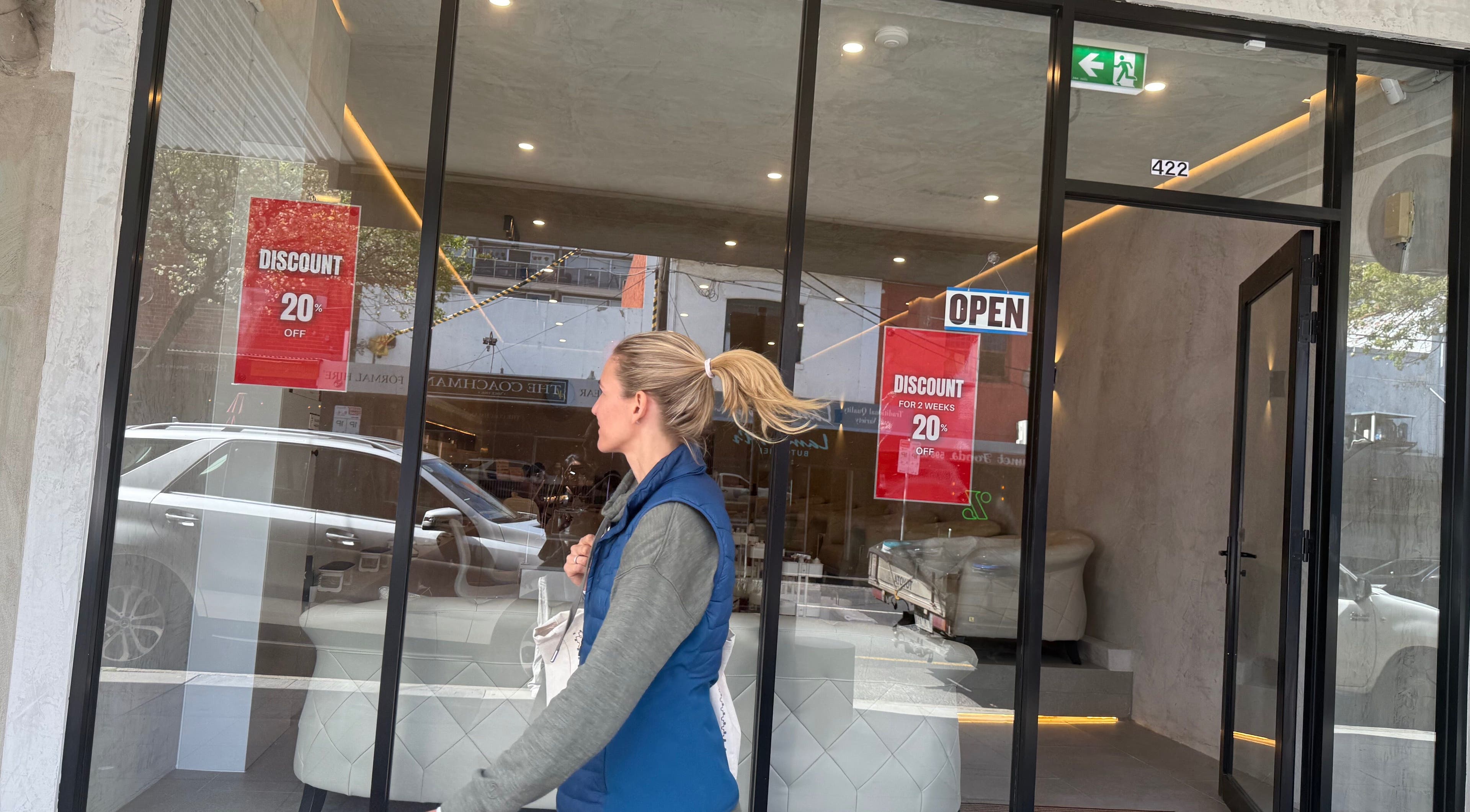 AK.nails _salon storefront in Melbourne, Victoria, AU with a 20% discount sign displayed prominently.