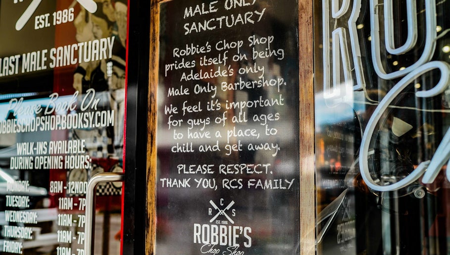 Robbie's Chop Shop in Adelaide, South Australia, AU. Exclusive male-only barbershop entrance sign.