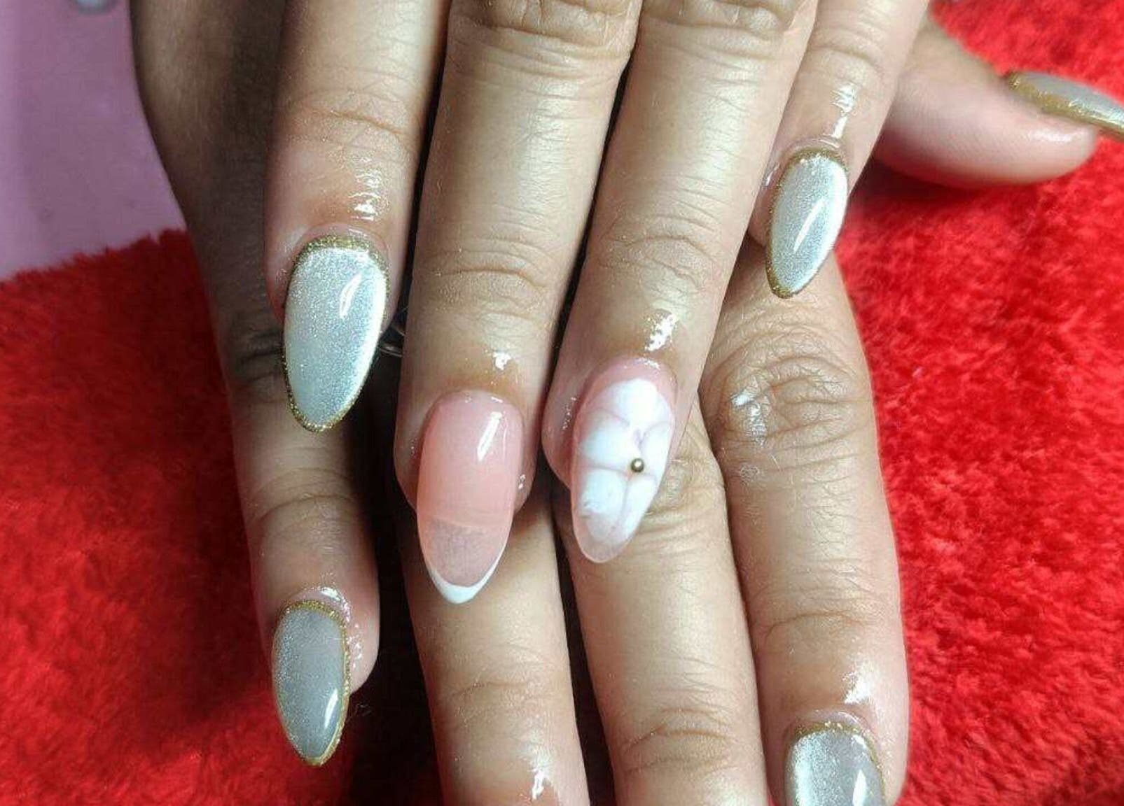 Elegant nail art on display at All Glammed Up in Cebu City, Central Visayas, PH, showcasing intricate designs.