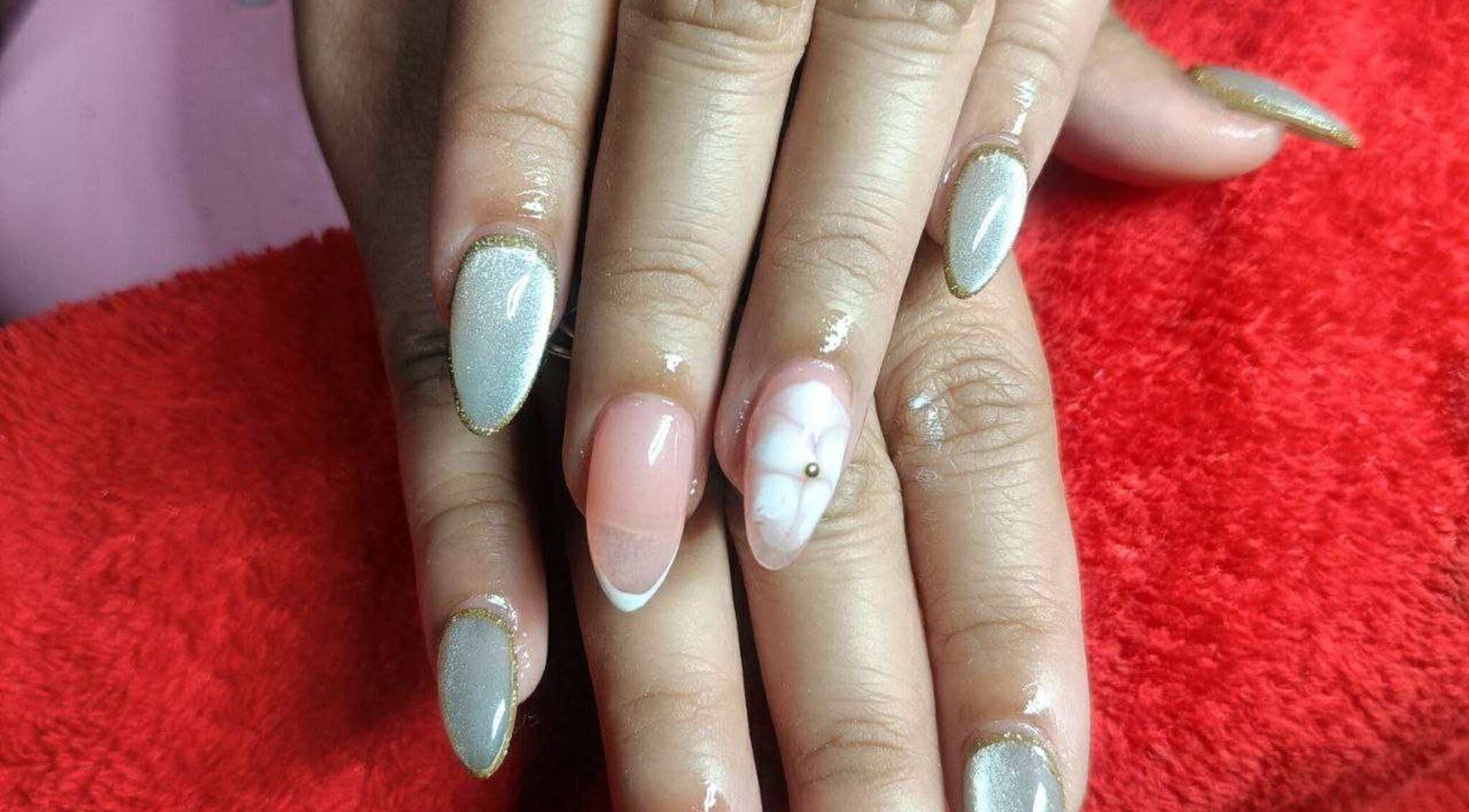 Elegant nail art on display at All Glammed Up in Cebu City, Central Visayas, PH, showcasing intricate designs.