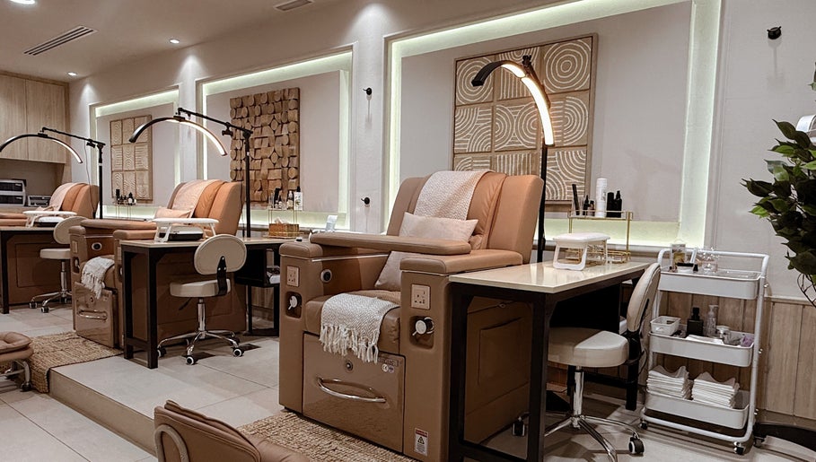 Luxurious pedicure chairs at Lish Hair & Beauty - JBR, Dubai, AE offer comfort and style in a tranquil setting.