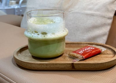 Comforting latte with biscuit at Lish Hair & Beauty - JBR, Dubai, AE.