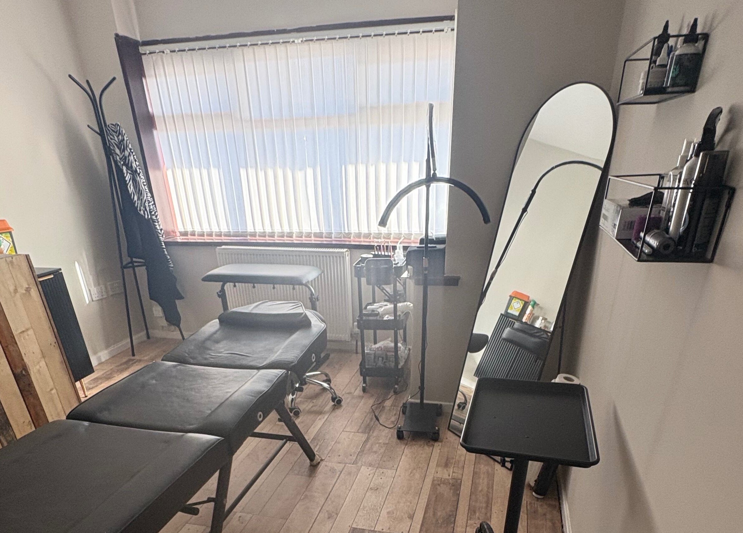 Tranquil treatment room at Pretty&Pain, Willenhall, England, GB, featuring stylish decor and modern equipment.
