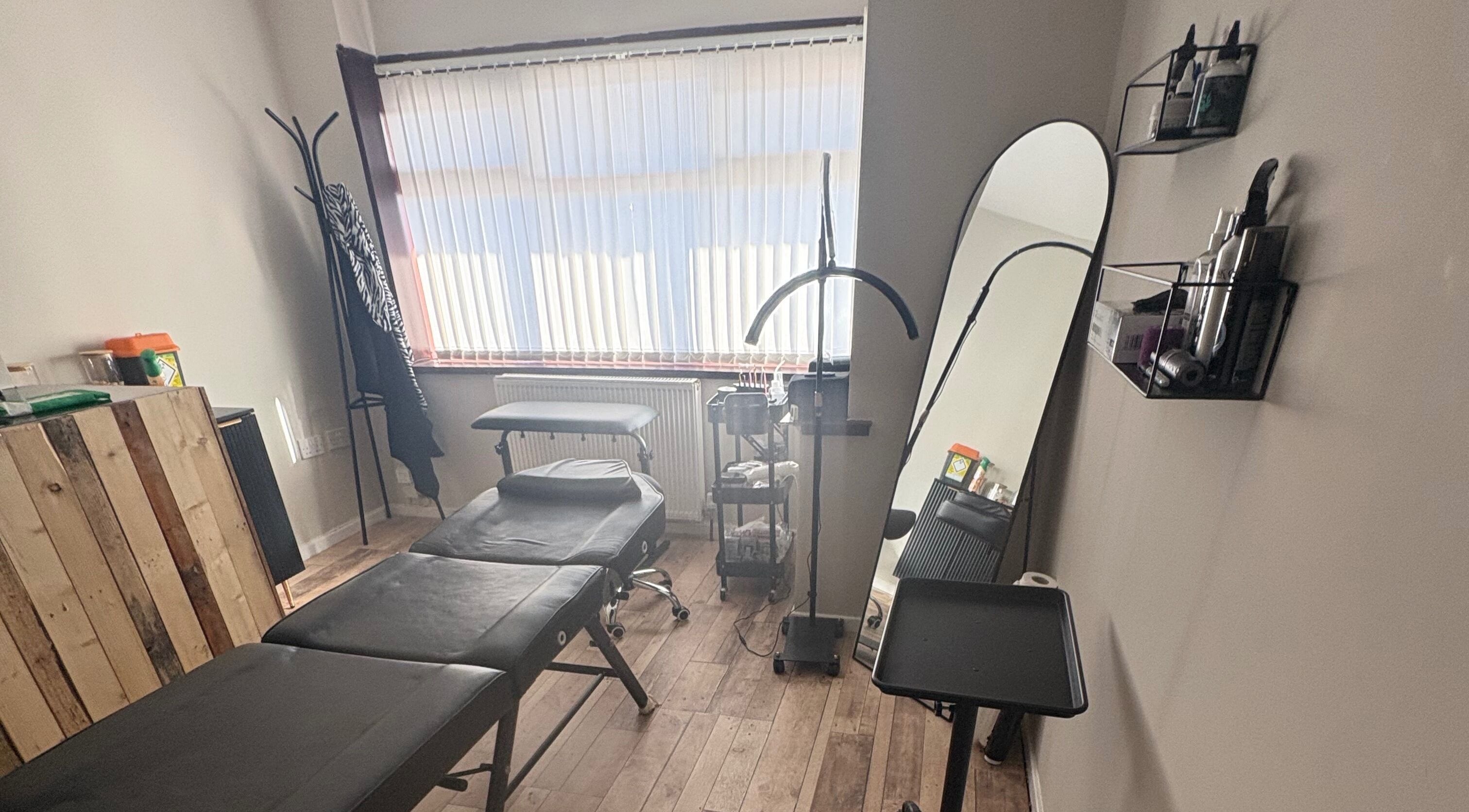 Tranquil treatment room at Pretty&Pain, Willenhall, England, GB, featuring stylish decor and modern equipment.