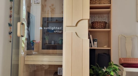 Ochroma home Sauna in Brighton And Hove, England, GB offers a cozy wooden interior with shelving decoration.