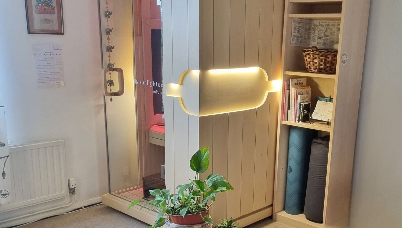 Ochroma home Sauna offers cozy relaxation in Brighton And Hove, England, GB, with warm lighting and natural decor.