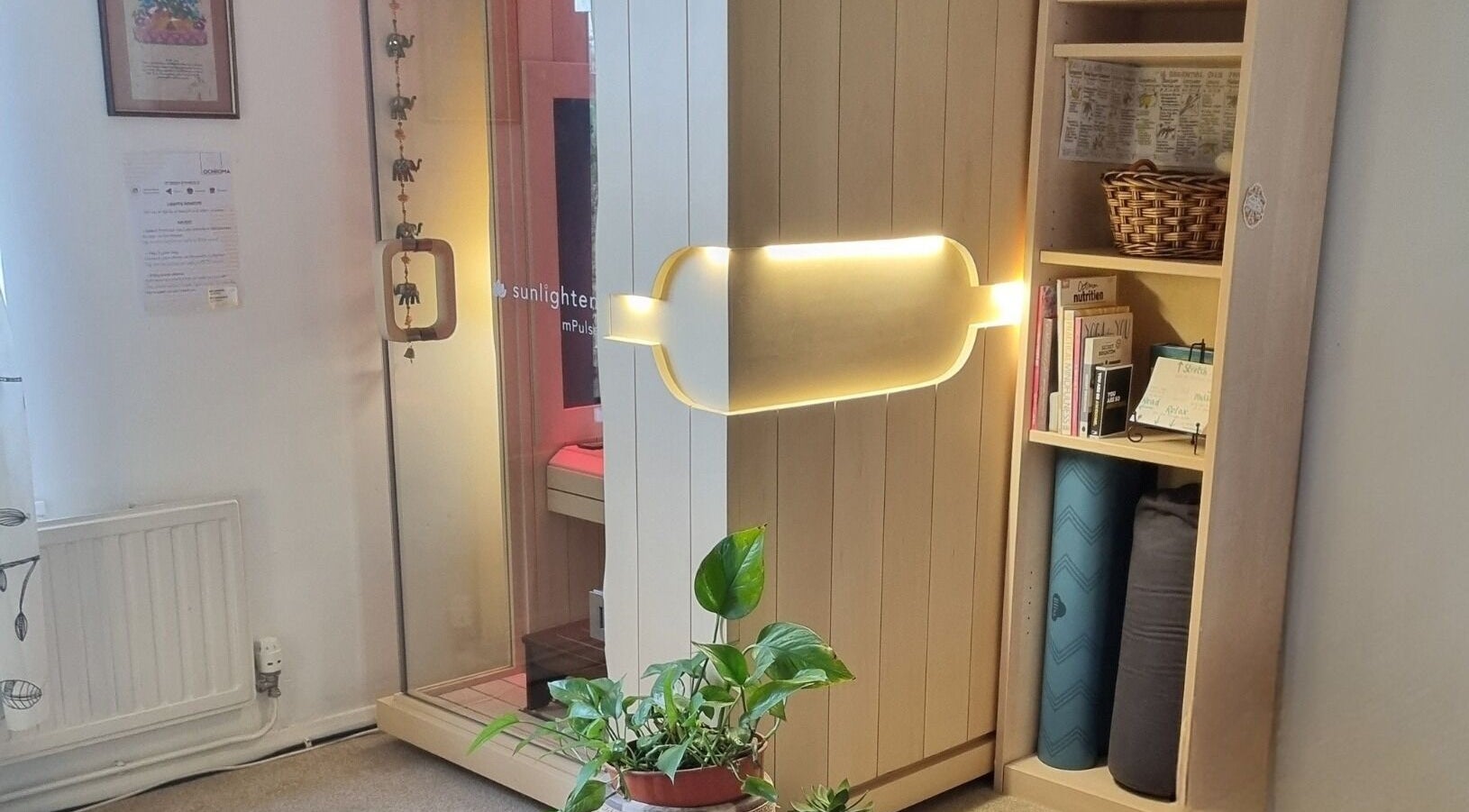 Ochroma home Sauna offers cozy relaxation in Brighton And Hove, England, GB, with warm lighting and natural decor.