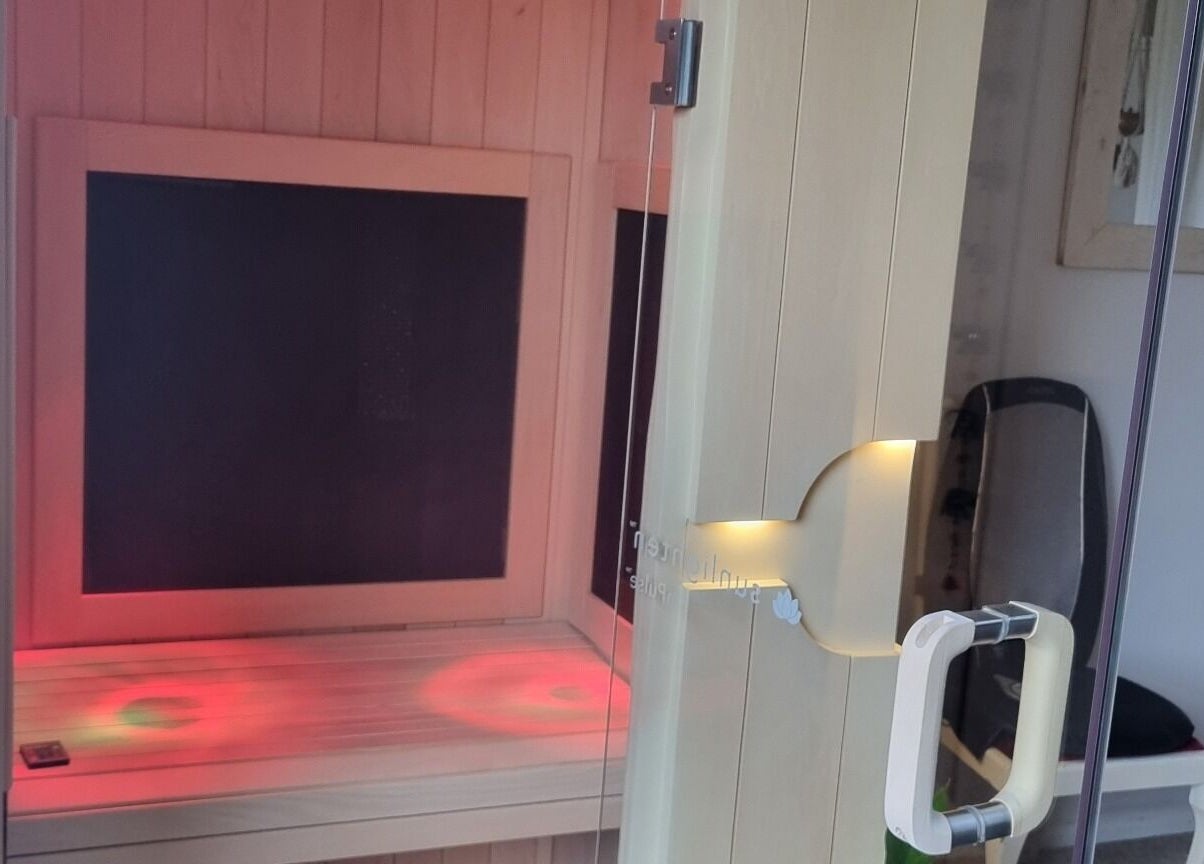 Ochroma home Sauna in Brighton And Hove, England, GB, showcasing a tranquil wooden interior with inviting lighting.