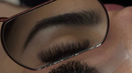 Eyelashes enhanced at Studio By Simo, Thornaby, England, GB, reflecting perfection in a beauty mirror.