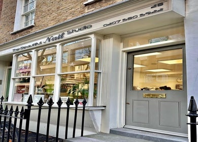 Exterior view of Glam Queen by Bilqis in London, England, GB, showcasing elegant storefront design.