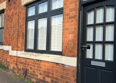 Entrance of Beauty Haven with rustic brick facade at Rothwell, England, GB.