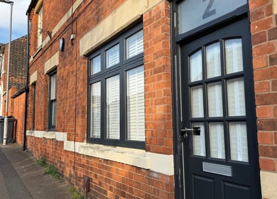 Front view of Beauty Haven in Rothwell, England, GB showcasing its elegant brick exterior and inviting entrance.