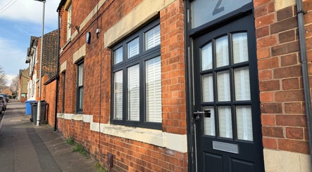 Front view of Beauty Haven in Rothwell, England, GB showcasing its elegant brick exterior and inviting entrance.
