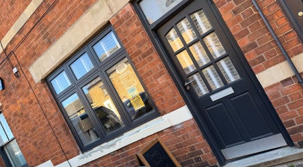 Charming exterior of Beauty Haven's front door in Rothwell, England, GB, showcasing a welcoming entrance.