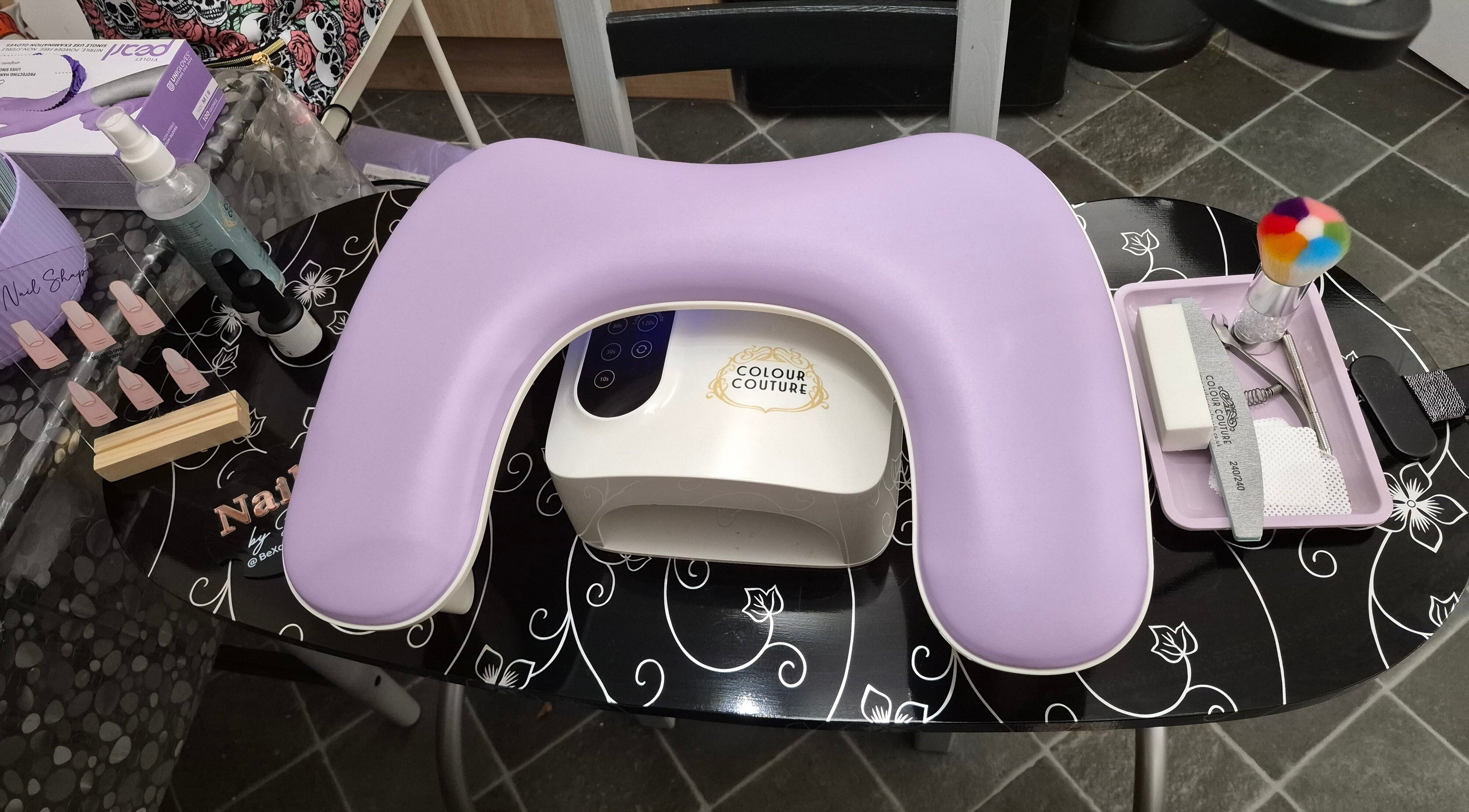 BeXquisite Nails setup in Hucknall, England, GB featuring manicure tools and Color Couture lamp.