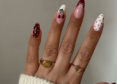 Stylish nail art with cherries at Nails by Stacey, Newcastle-under-lyme, England, GB.
