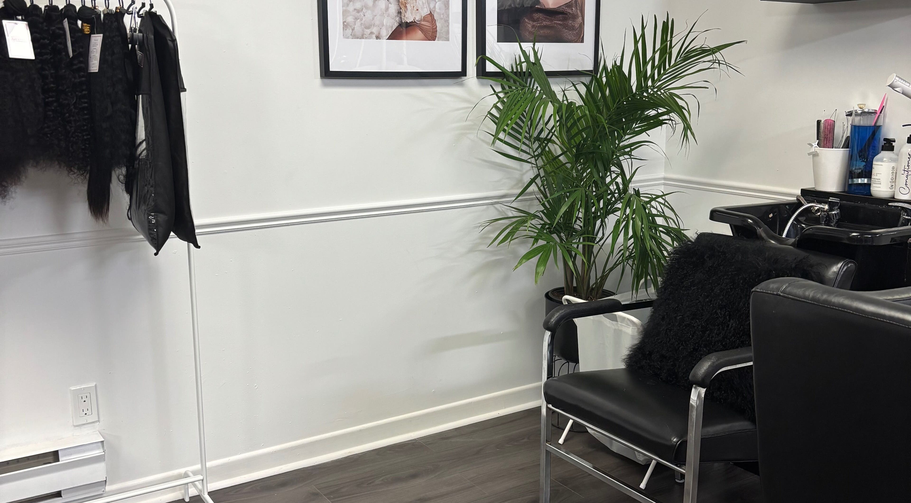 Modern salon corner at Thy Professional | Thybeautybar Dundas, Hamilton, Ontario, CA with sleek seating and decor.