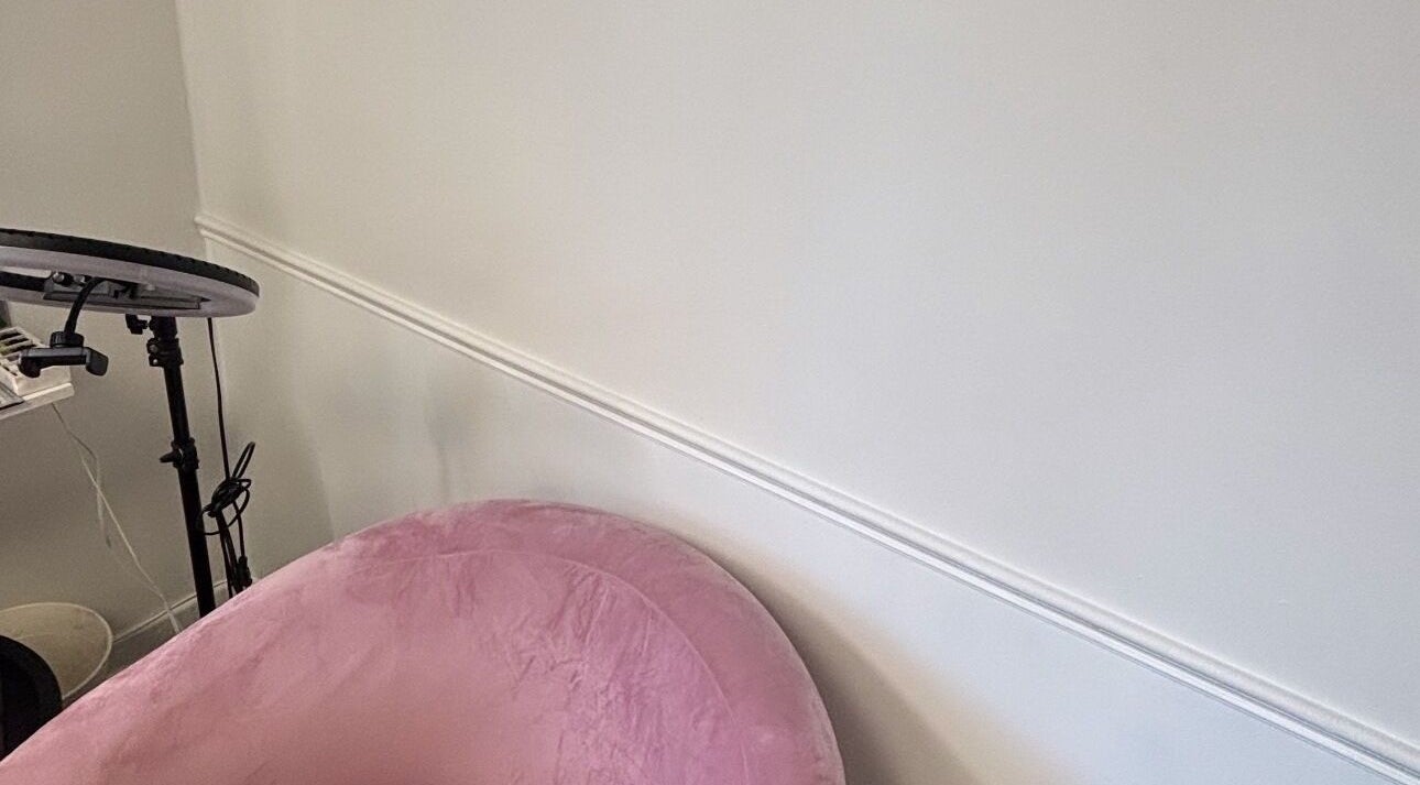 Chic pink chair at Thy Professional | Thybeautybar Dundas, Hamilton, Ontario, CA. Ideal for beauty and wellness.