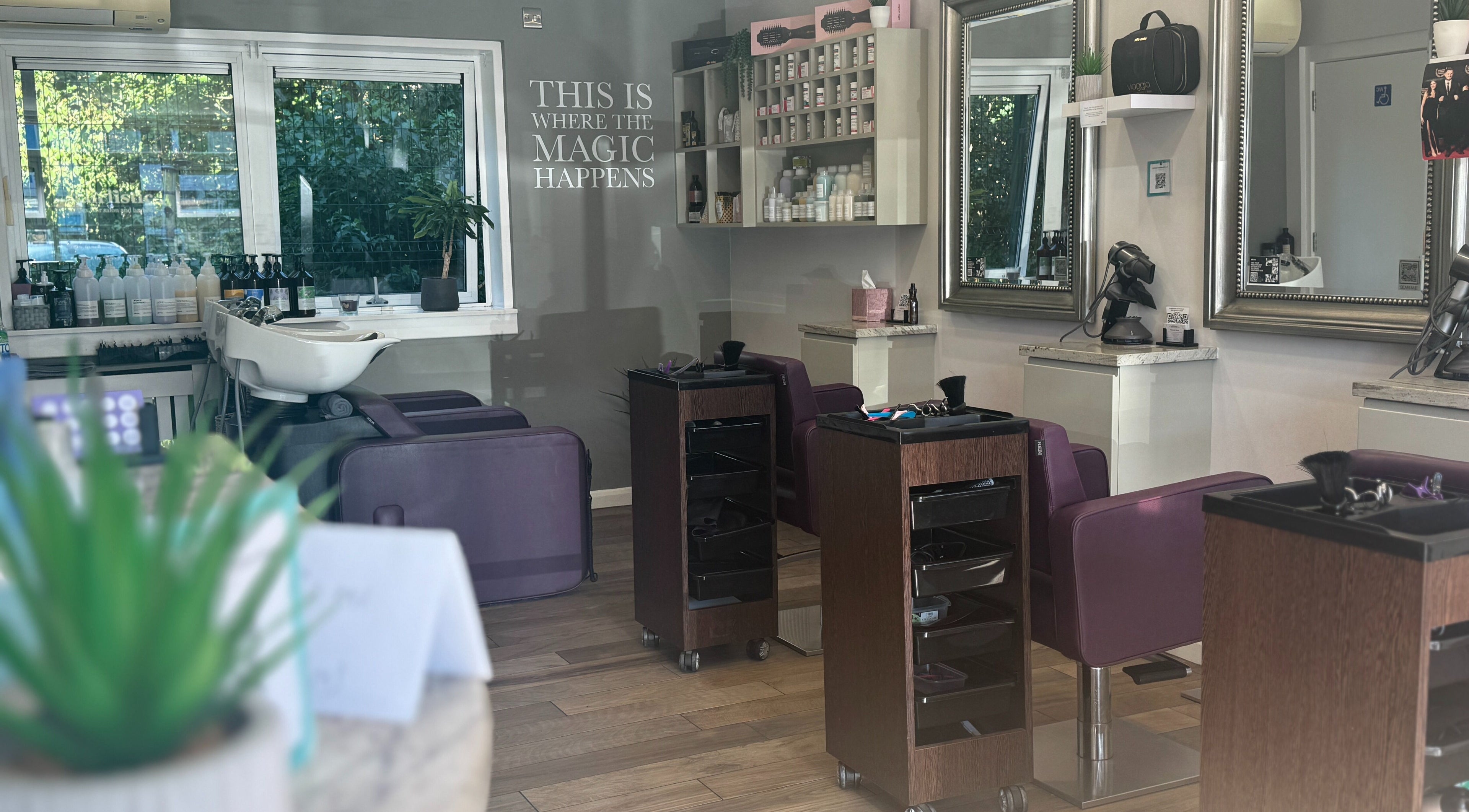Interior of Hairlistic Hair Salon And Barbers, Kesgrave, England, GB showcasing elegant styling stations.