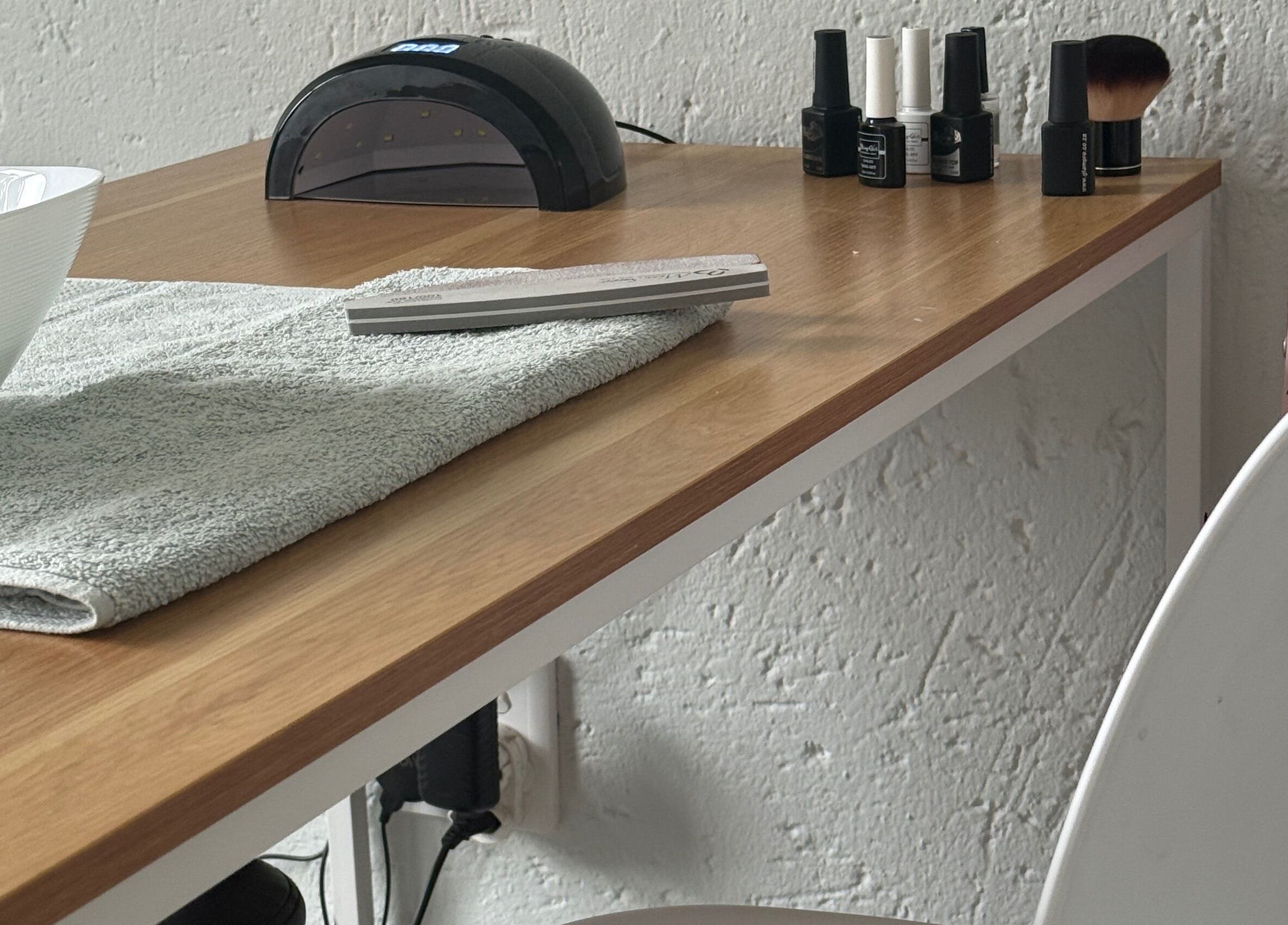 Nail care station at Beauty With Age, Benoni, Gauteng, ZA featuring manicure tools and products.