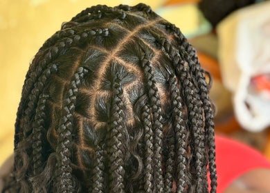 Style de nattes tressées chez MRK.HAIRSTYLE, Le Lamentin, Fort-de-France, MQ, pour une coiffure raffinée.