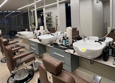 Modern barber chairs at MAST BARBER RESORT, Καλαμαριά, GR offering luxury grooming services.