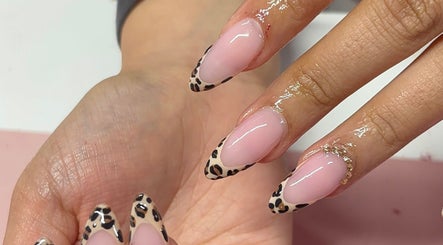 Stylish leopard print nail art at Nua Nails, Bradford, England, GB. Chic and trendy nail designs.
