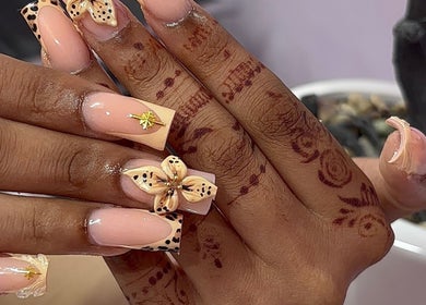 Elegant nail art with floral designs at Nua nails, Bradford, England, GB.