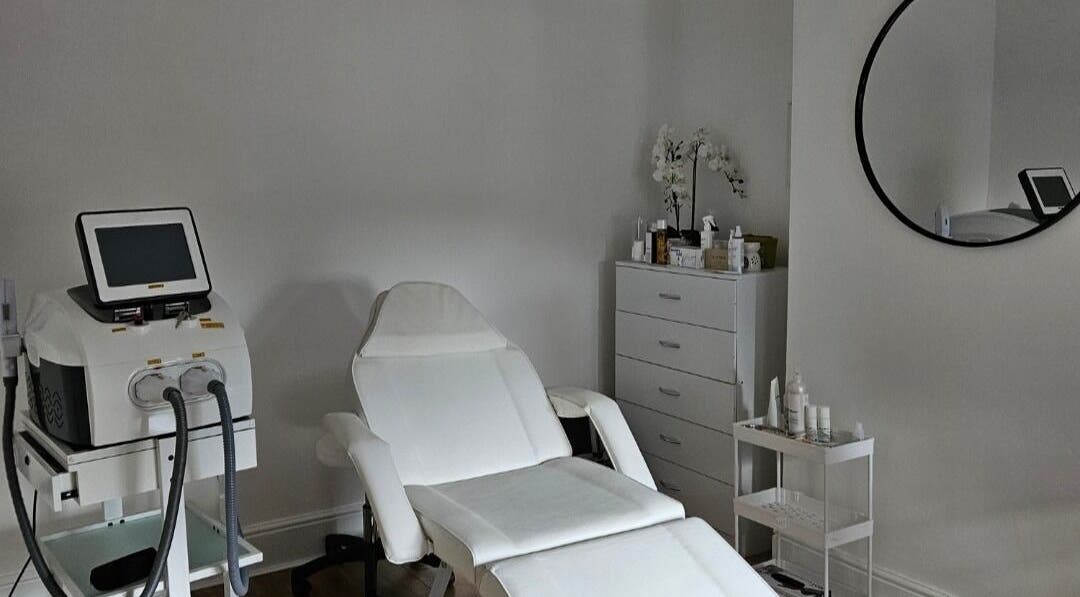 Modern aesthetics treatment room at Eva Garcia Aesthetics, Liverpool, England, GB, with white equipment and decor.