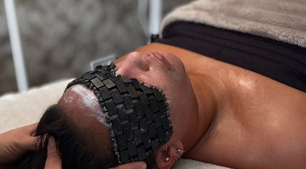 Person receiving stone facial treatment at Beauty By Alessia, Bedford, England, GB.