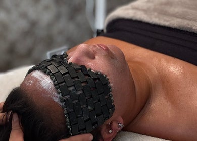 Relaxing facial treatment at Beauty By Alessia, Bedford, England, GB with soothing black stone mask.