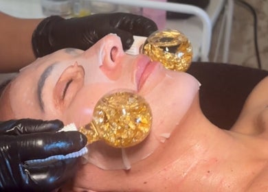 Rejuvenating facial with gold-infused globes at Beauty By Alessia, Bedford, England, GB.