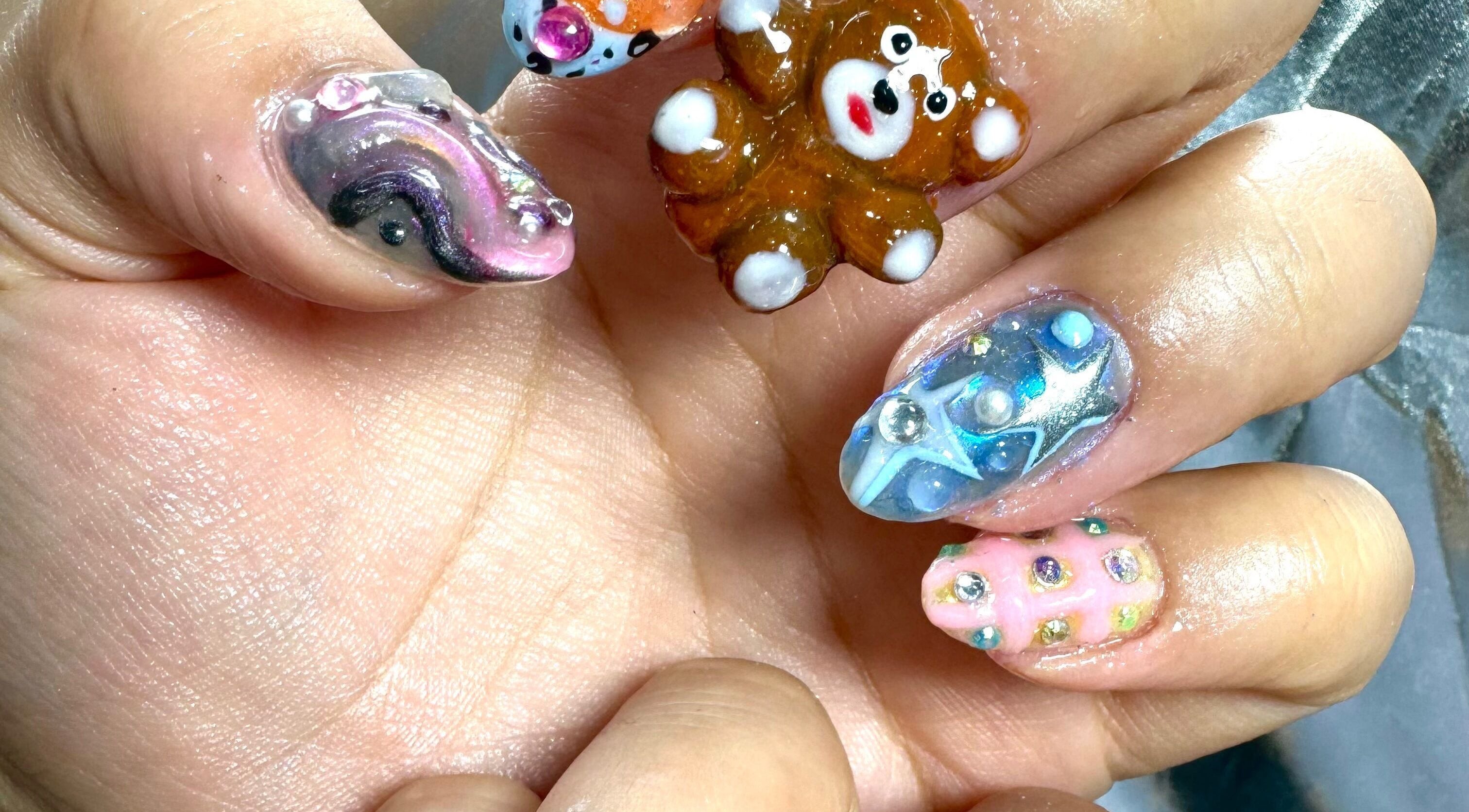 3D nail art designs at Arise Beauty by Catalina Popa, Huddersfield, England, GB, showcasing fun and vibrant styles.