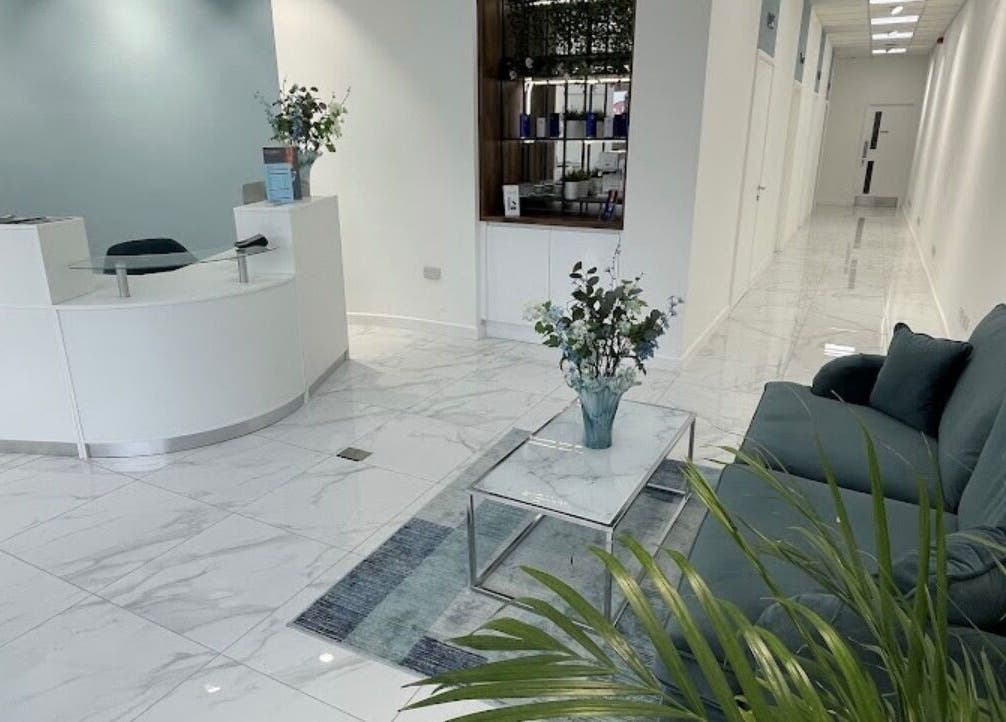 Elegant reception at Classylovelash, Birmingham, England, GB, with modern decor and plush seating.