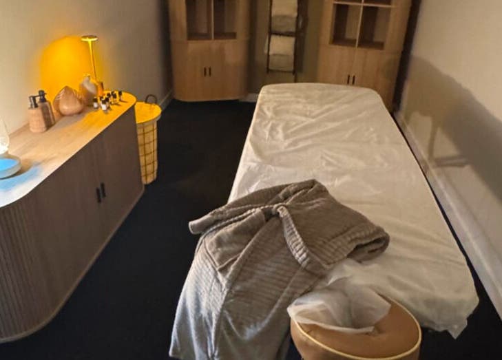 Relaxing treatment room at Clear Canvas Tattoo Removal, Peterhead, Scotland, GB, with cozy decor and ambient lighting.