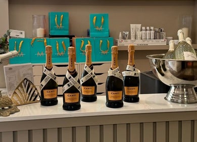 Elegant display of champagne bottles at Amy Nicole, Neath, Wales, GB, creating a luxurious ambiance.