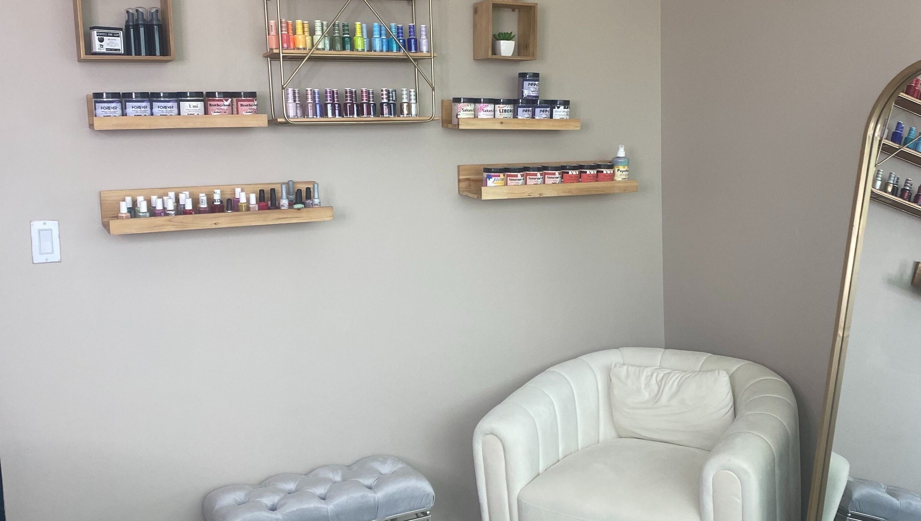 Shelves with beauty products and a plush chair at Hidden Gem, Rockdale, Texas, US.