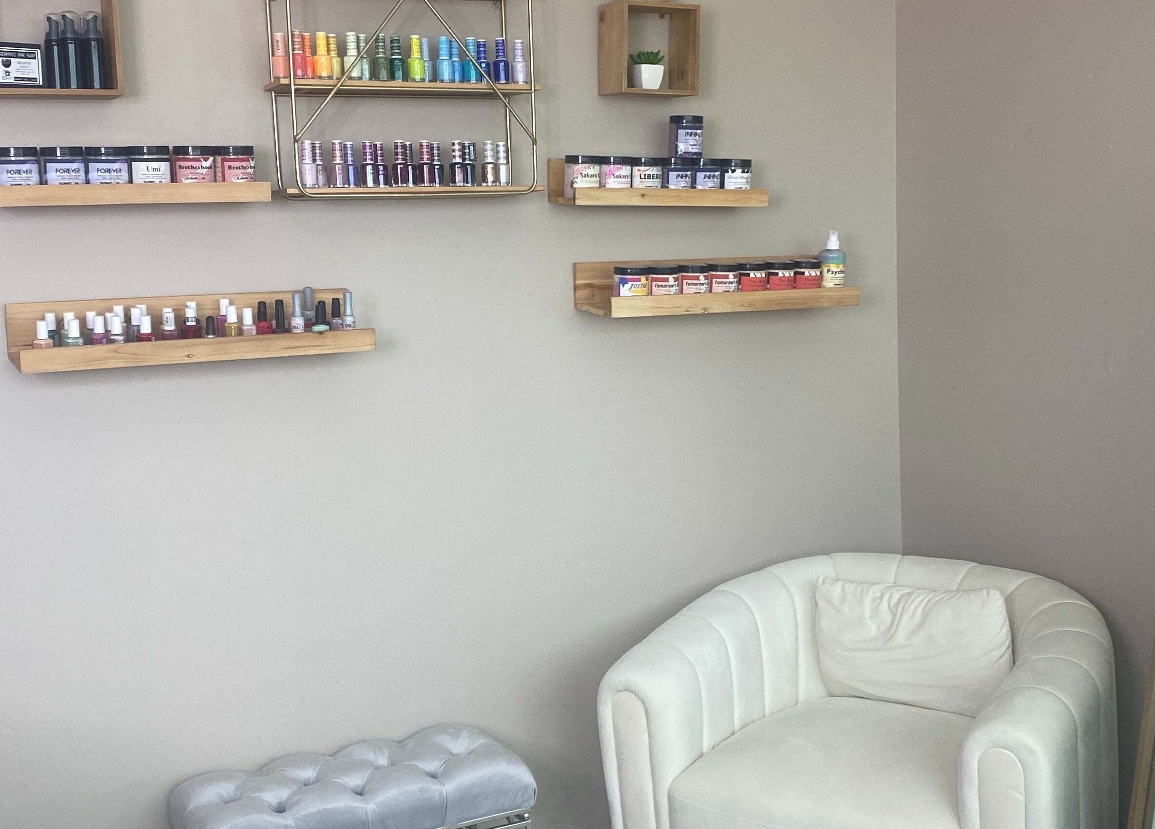 Shelves with beauty products and a plush chair at Hidden Gem, Rockdale, Texas, US.