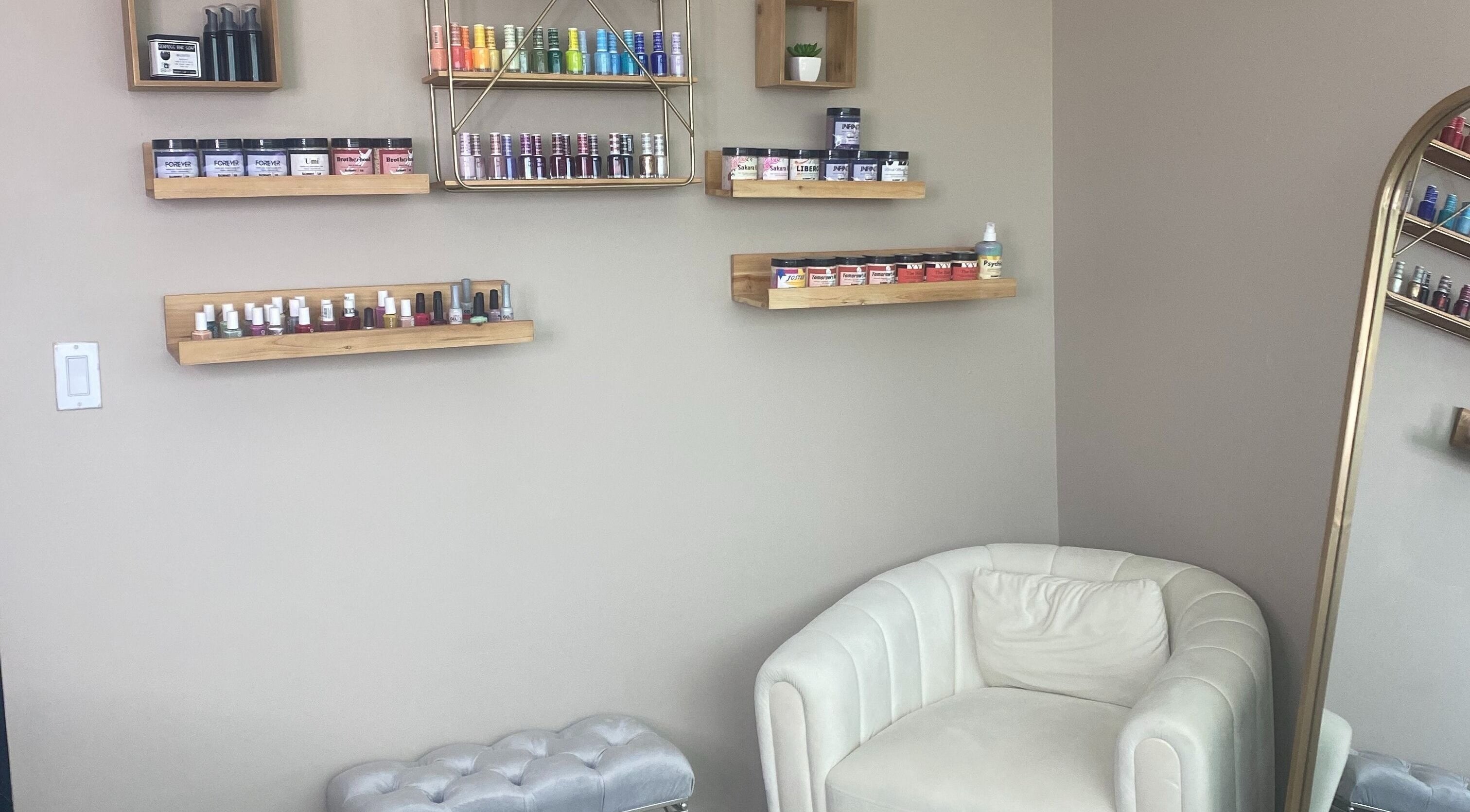 Shelves with beauty products and a plush chair at Hidden Gem, Rockdale, Texas, US.