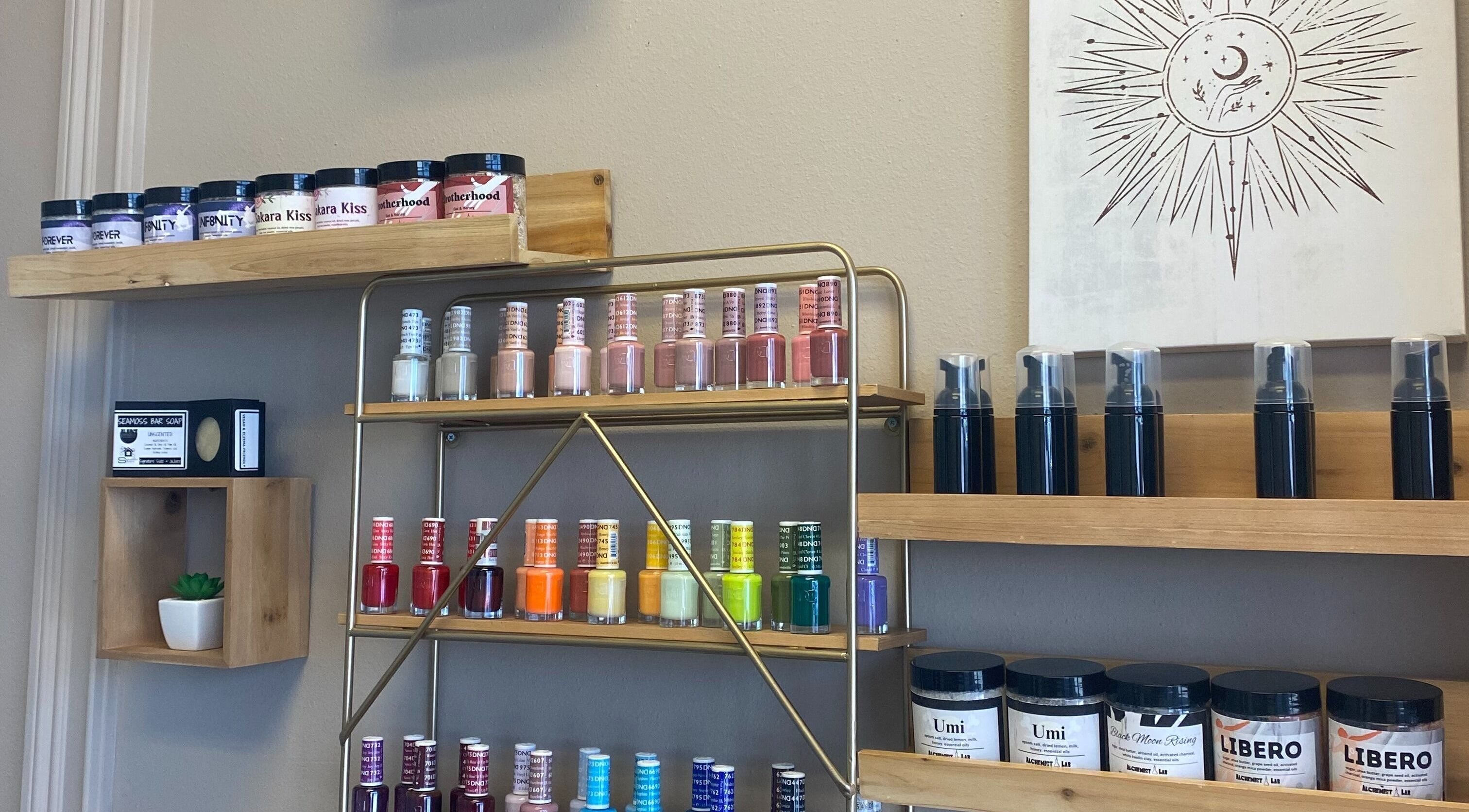 Nail polish display at Hidden Gem, Rockdale, Texas, US, showcasing beauty products and art.