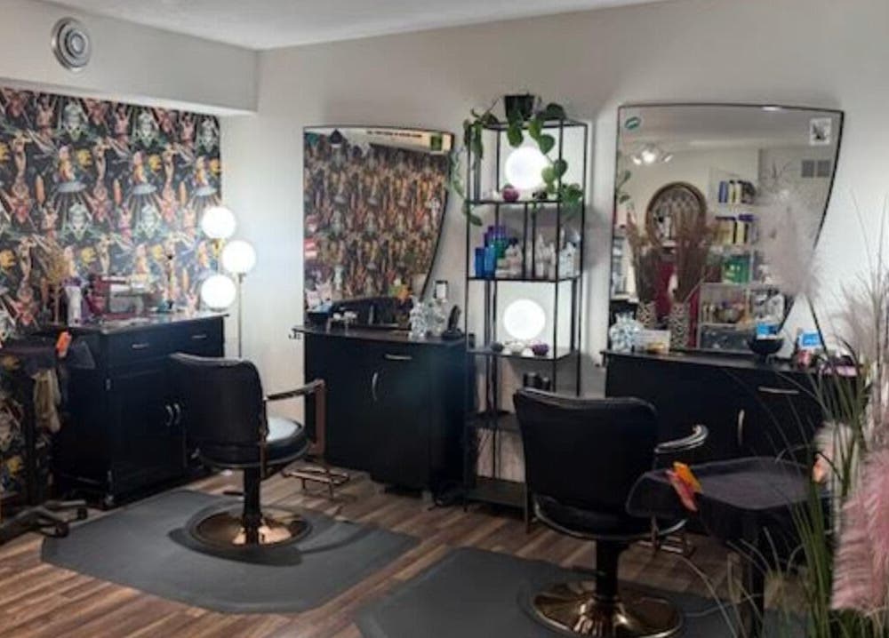Stylish salon chairs and mirrors at Rock N Rollerz Salon, Minneapolis, Minnesota, US.