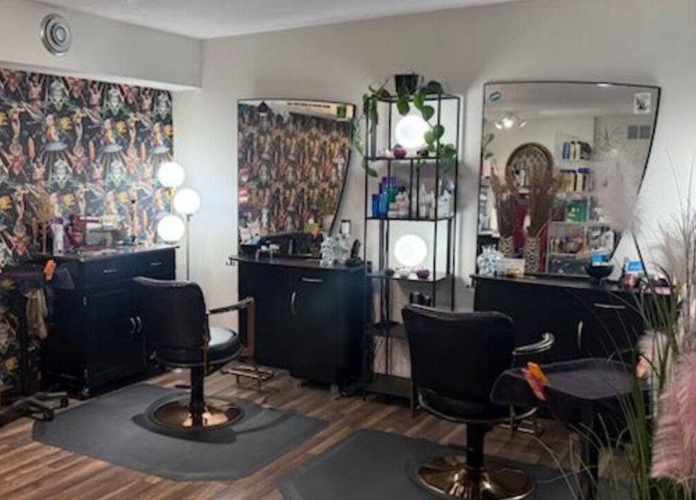 Stylish salon chairs and mirrors at Rock N Rollerz Salon, Minneapolis, Minnesota, US.