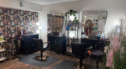 Stylish salon chairs and mirrors at Rock N Rollerz Salon, Minneapolis, Minnesota, US.