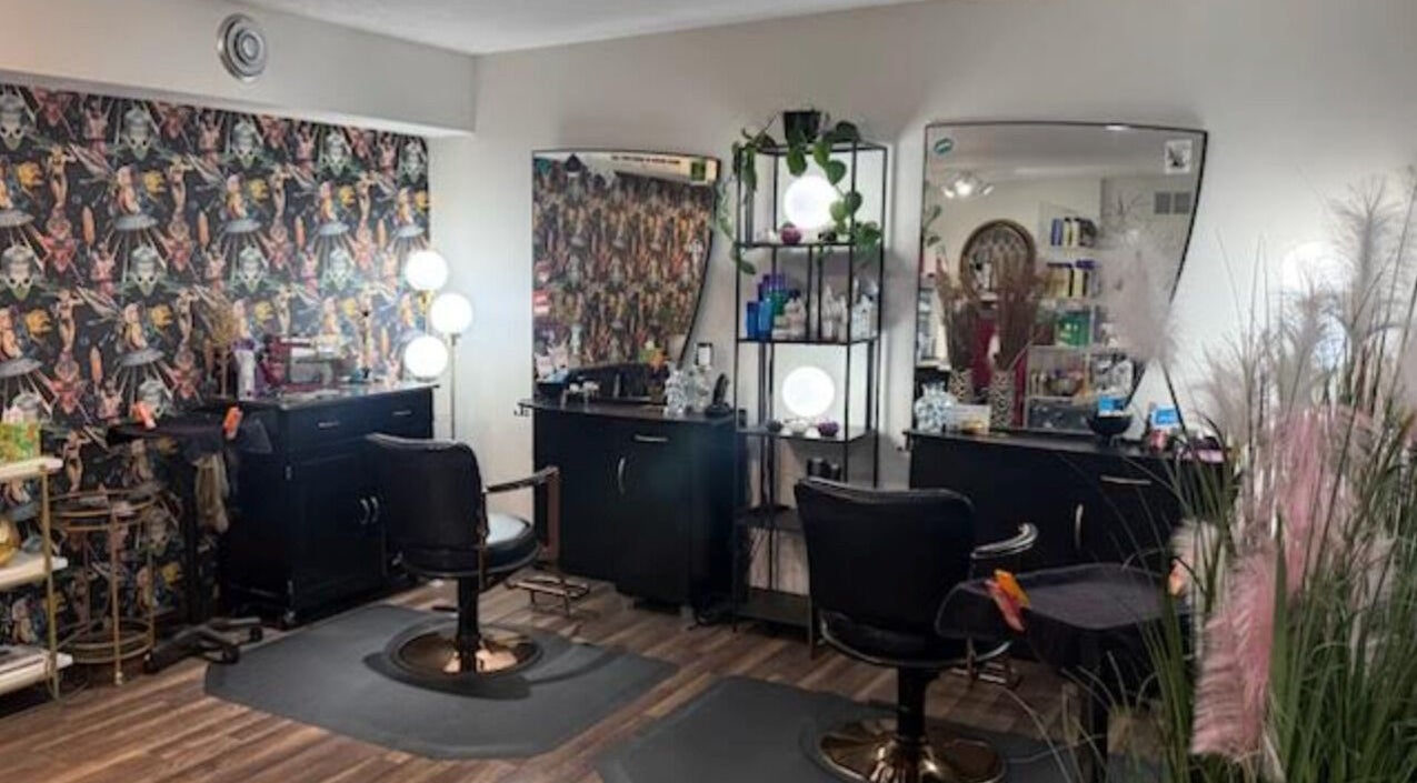 Stylish salon chairs and mirrors at Rock N Rollerz Salon, Minneapolis, Minnesota, US.