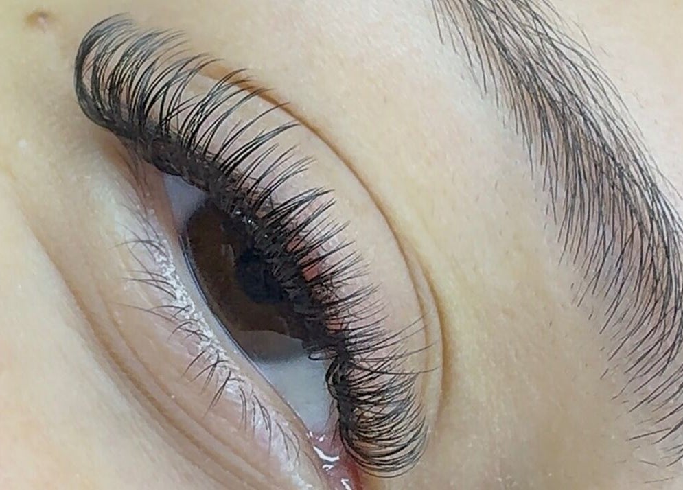 Closeup of elegant eyelash extensions at Gloomskin Studio in Texas, Texas, US.