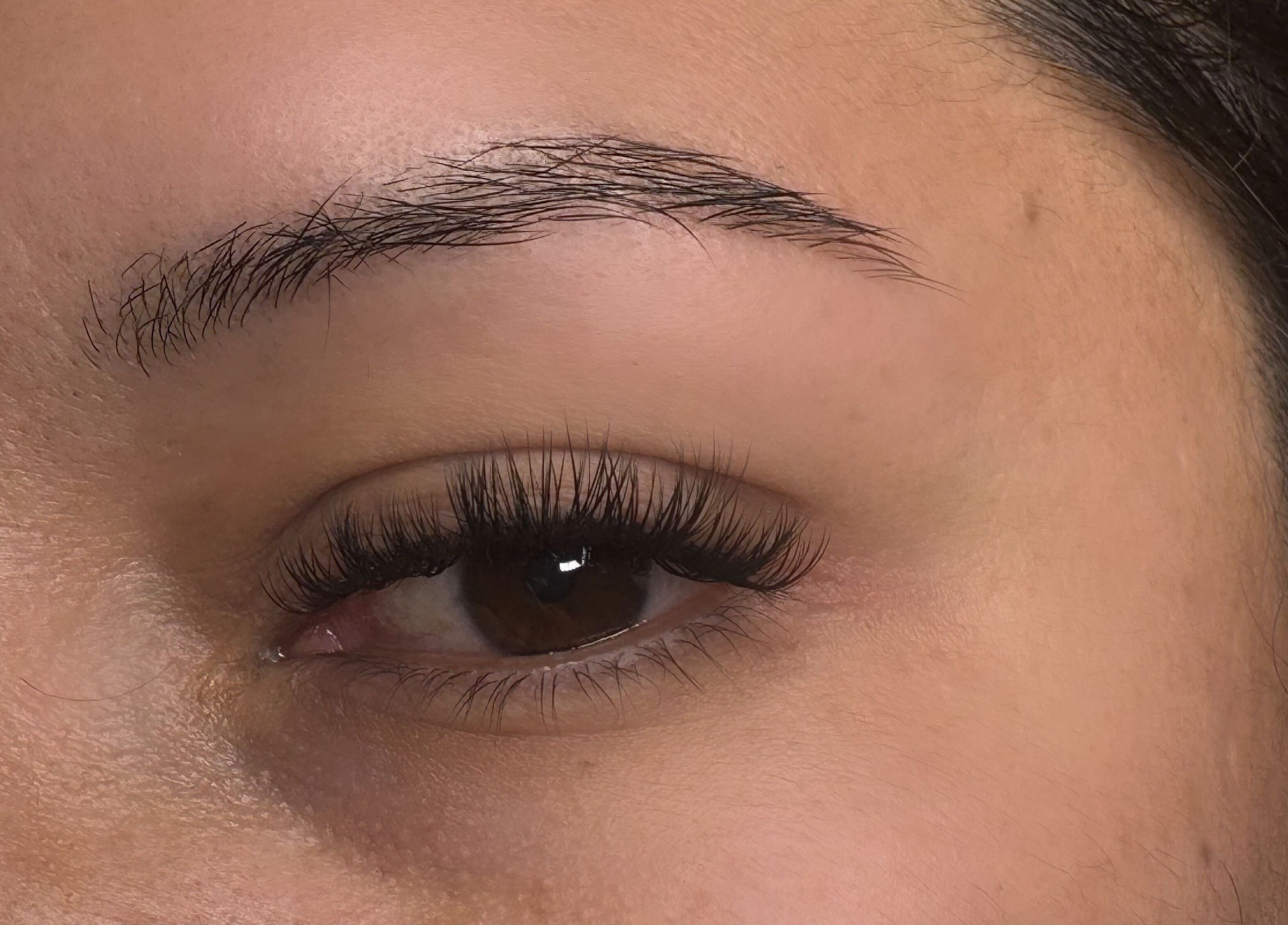 Close-up of enhanced lashes at Gloomskin Studio, Texas, Texas, US, showcasing beauty services.