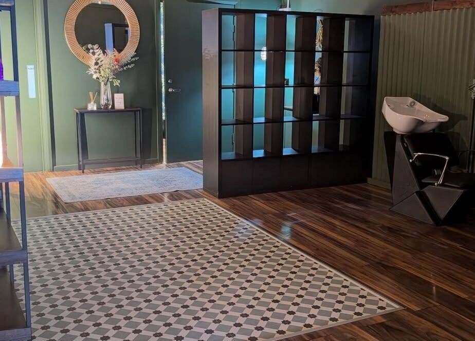 Modern interior at Lisa at Hubxx Salon in Dunmurry, Northern Ireland with chic decor and elegant flooring.